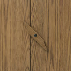 Close up of Four Hands Bedford Media Console in Warm Natural Oak Veneer on a white background at Addison West