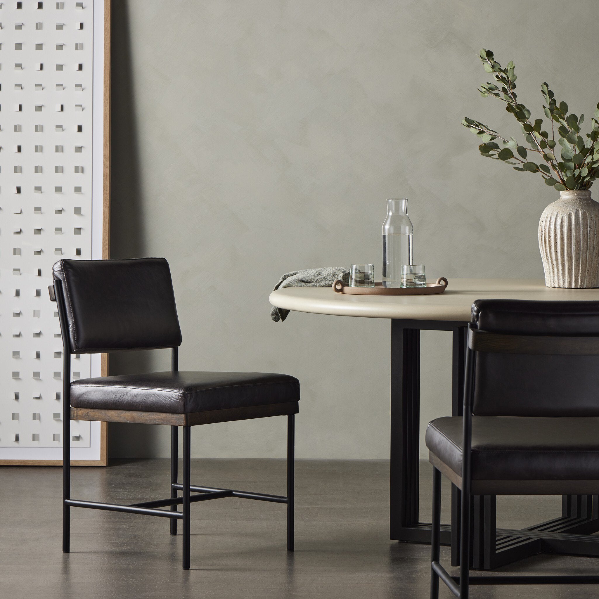 Four Hands Benton Dining Chair in Sonoma Black in dining room at Addison West.