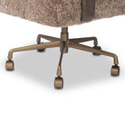Close up of Four Hands Bergen Desk Chair in Taupe Shearling on a white background at Addison West