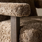 Close up of Four Hands Bergen Desk Chair in Taupe Shearling in an office  at Addison West