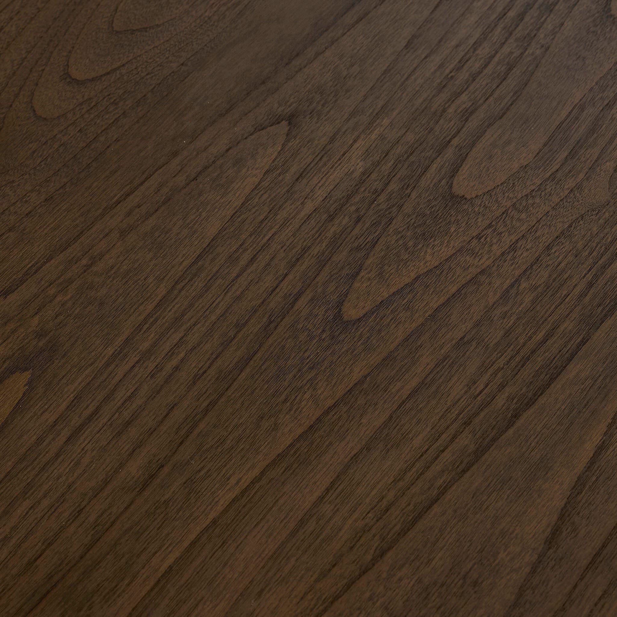 Detail image of the Four Hands Bertie Coffee Table Stained Saddle Brown Sungkai Veneer on white background at Addison West.