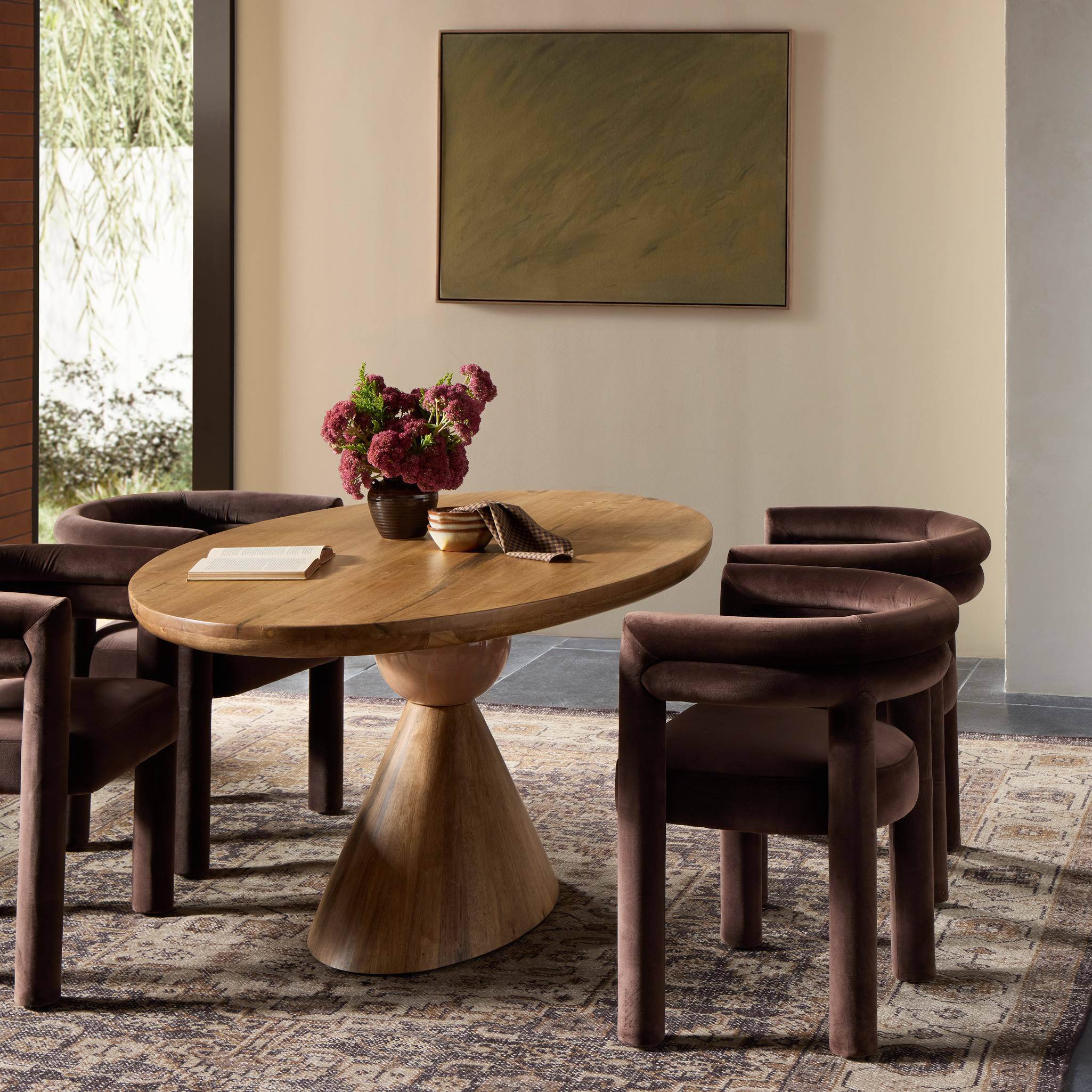 Four Hands Bibianna Oval Dining Table in Smoked Honey in dining room at Addison West.
