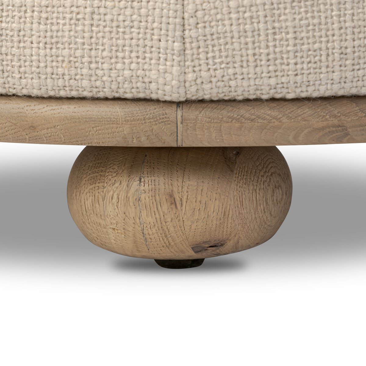 Close up of Four Hands Bilbury Ottoman in Saxon Sand on a white background at Addison West