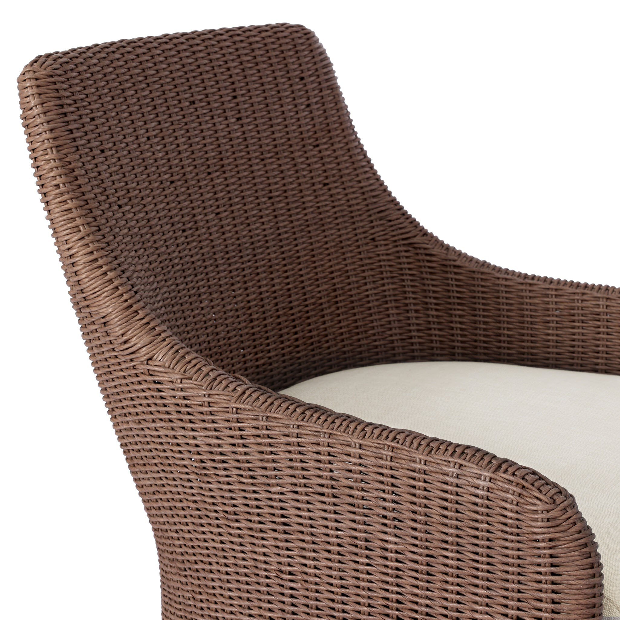 Close up of Four Hands Blaire Outdoor Swivel Chair in Tanned Weave on a white background at Addison West
