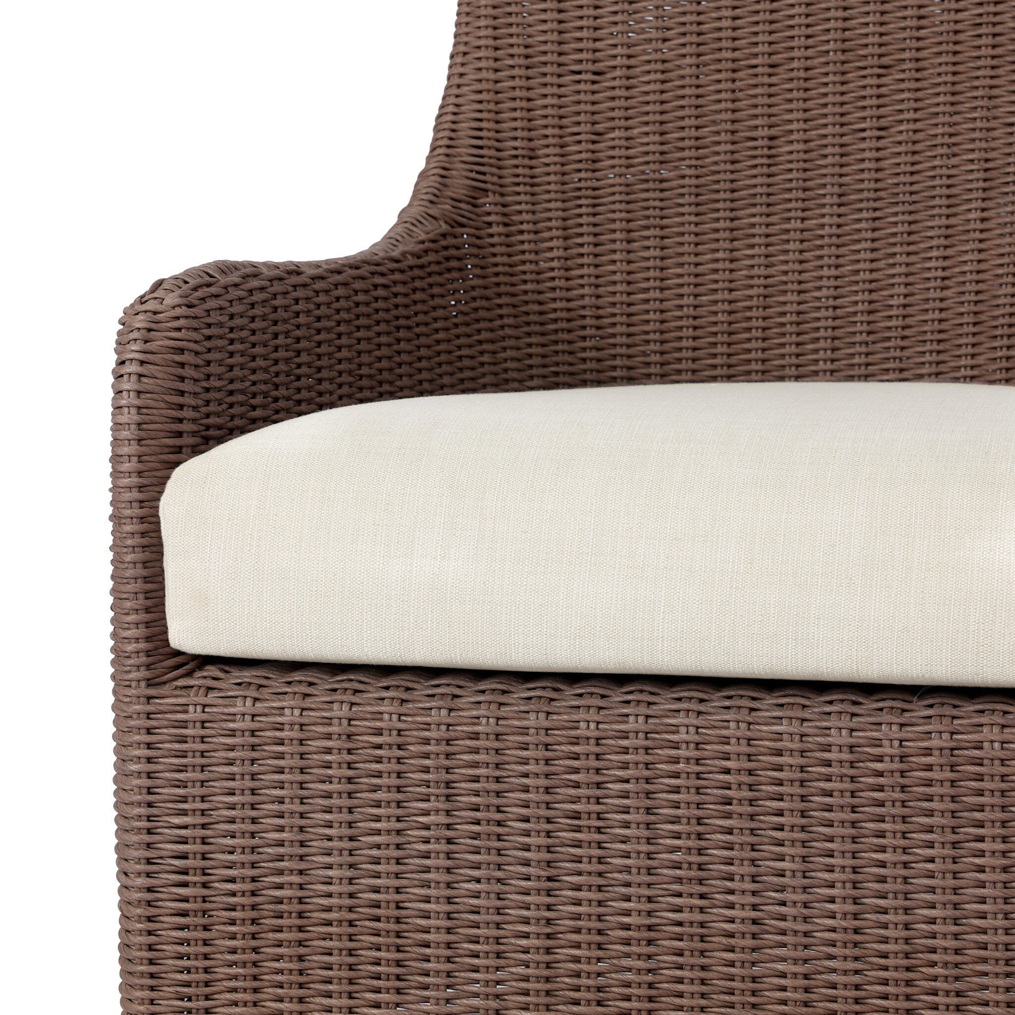 Close up of Four Hands Blaire Outdoor Swivel Chair in Tanned Weave on a white background at Addison West