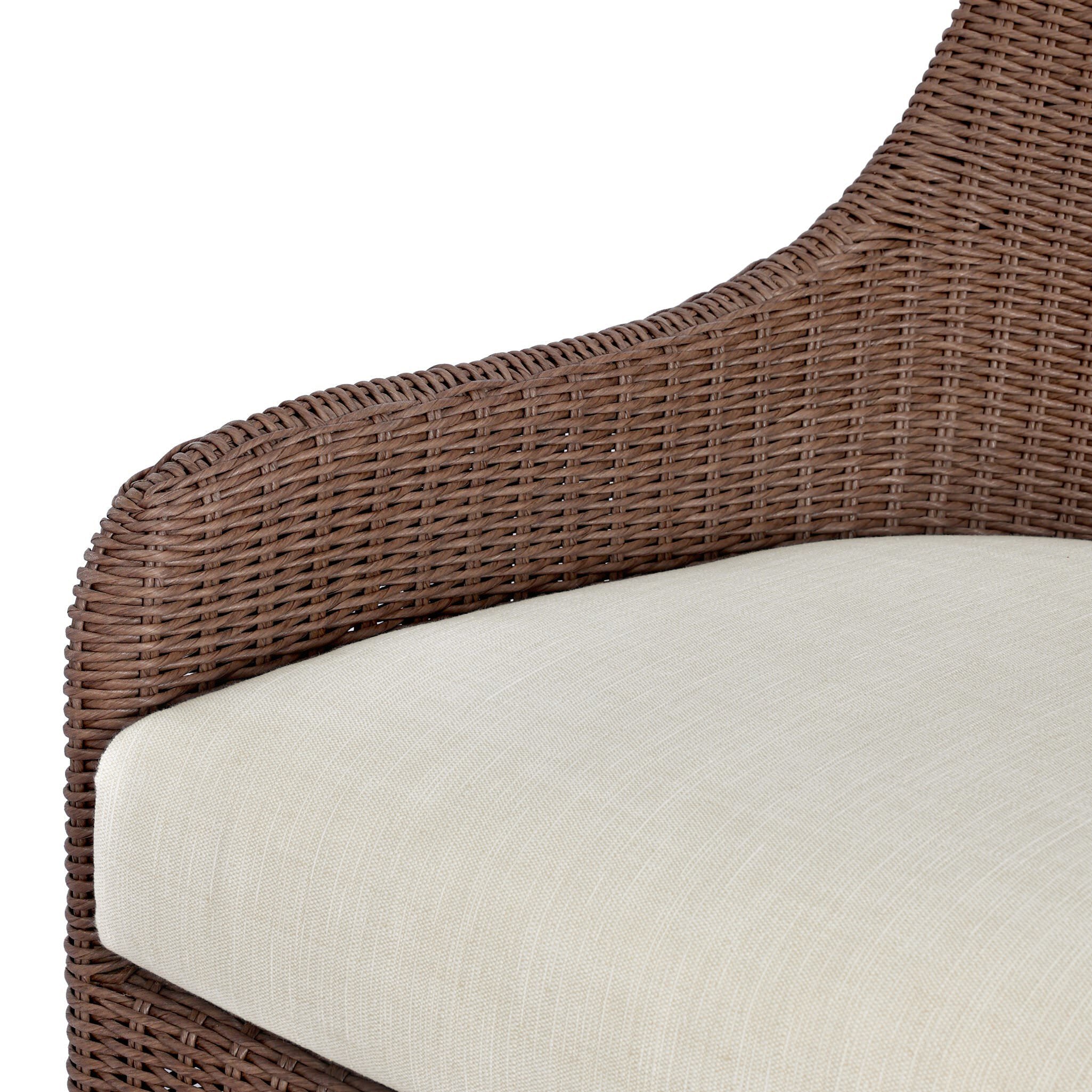 Close up of Four Hands Blaire Outdoor Swivel Chair in Tanned Weave on a white background at Addison West