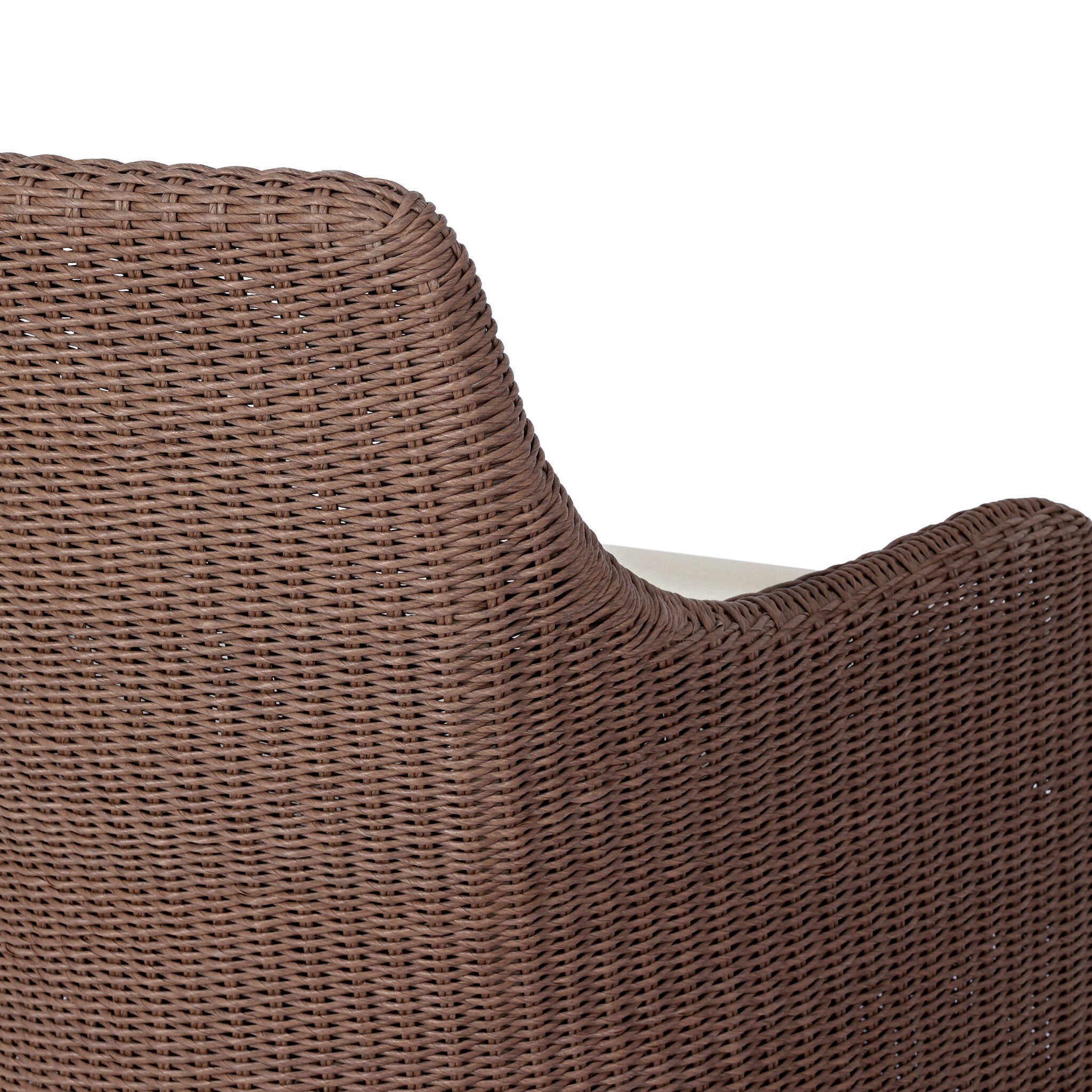 Close up of Four Hands Blaire Outdoor Swivel Chair in Tanned Weave on a white background at Addison West