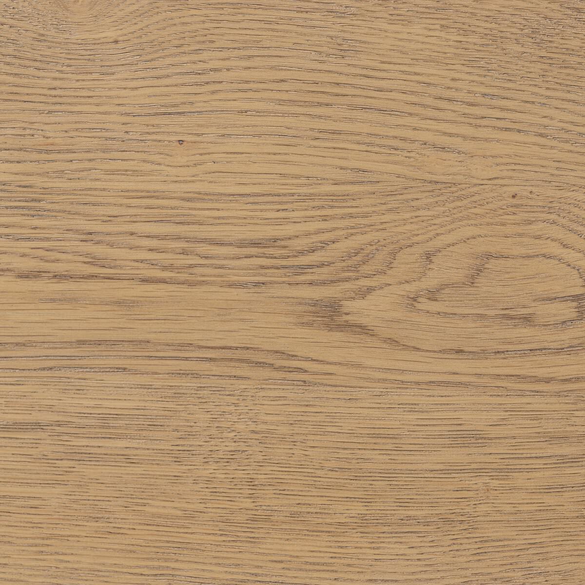 Close up of Four Hands Blinn Oval Leaf Extension Dining Table 88"-127" in Worn Oak Veneer on a white background at Addison West