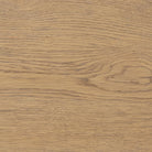 Close up of Four Hands Blinn Oval Leaf Extension Dining Table 88"-127" in Worn Oak Veneer on a white background at Addison West