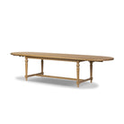 Four Hands Blinn Oval Leaf Extension Dining Table 88"-127" in Worn Oak Veneer on a white background at Addison West