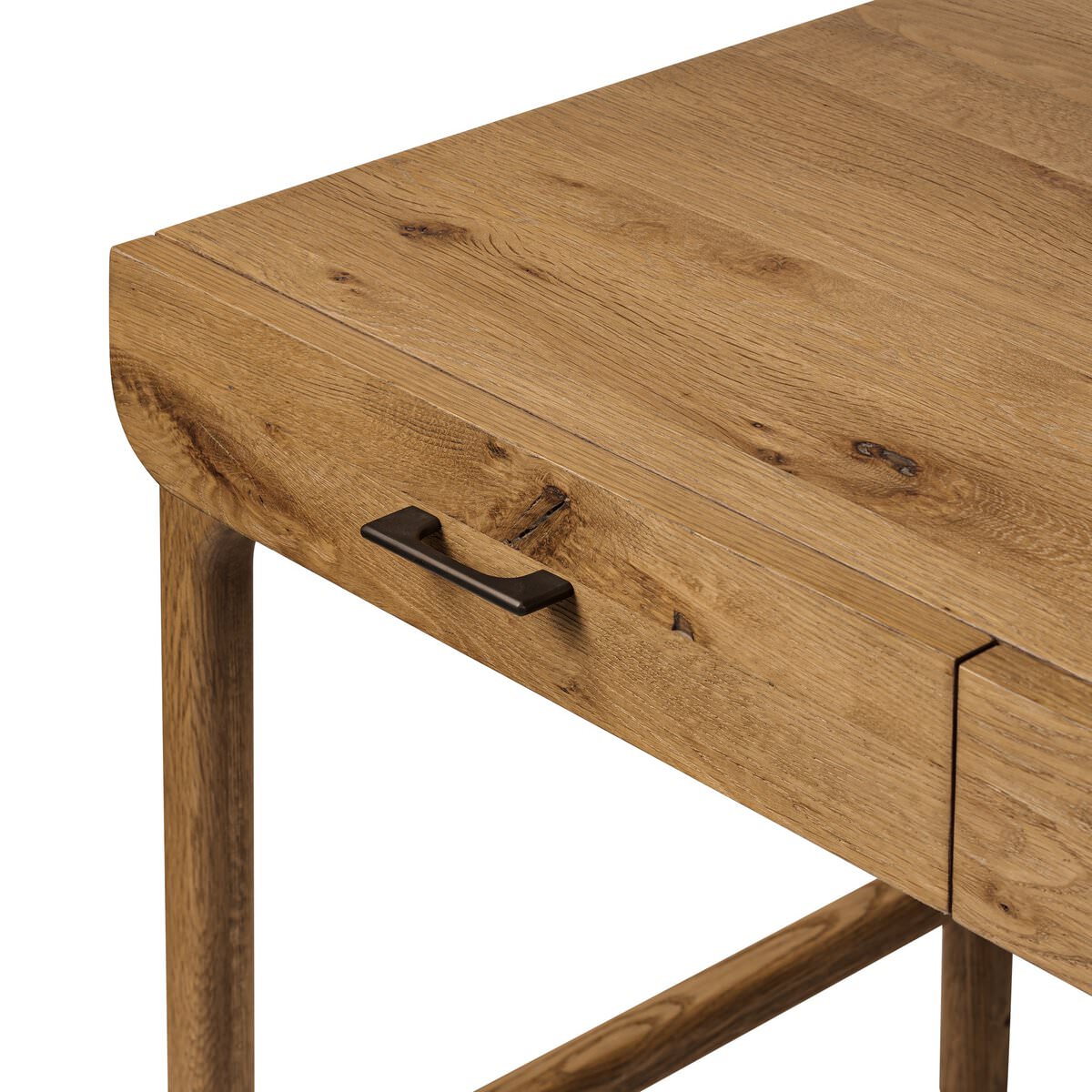 Close up of Four Hands Bloomfield Desk in Resawn Worn Oak on a white background at Addison West