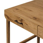 Close up of Four Hands Bloomfield Desk in Resawn Worn Oak on a white background at Addison West