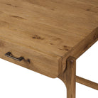 Close up of Four Hands Bloomfield Desk in Resawn Worn Oak on a white background at Addison West