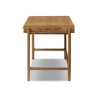 Side of Four Hands Bloomfield Desk in Resawn Worn Oak on a white background at Addison West