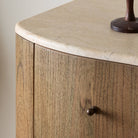 Close up of Four Hands Boa 6 Drawer Dresser in Sandy Mindi Veneer on a white background at Addison West