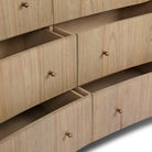 Close up of Four Hands Boa 6 Drawer Dresser in Sandy Mindi Veneer on a white background at Addison West