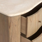 Close up of Four Hands Boa 6 Drawer Dresser in Sandy Mindi Veneer on a white background at Addison West