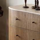 Close up of Four Hands Boa 6 Drawer Dresser in Sandy Mindi Veneer on a white background at Addison West