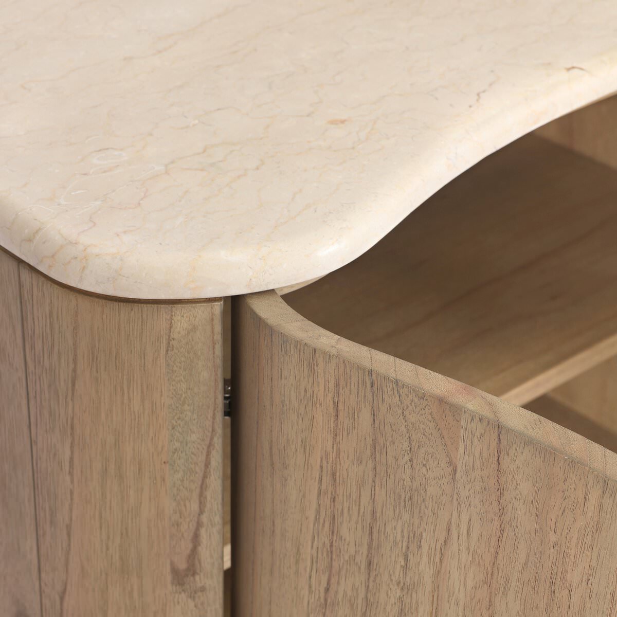 Close up of Four Hands Boa Nightstand in Cream Marble on a white background at Addison West