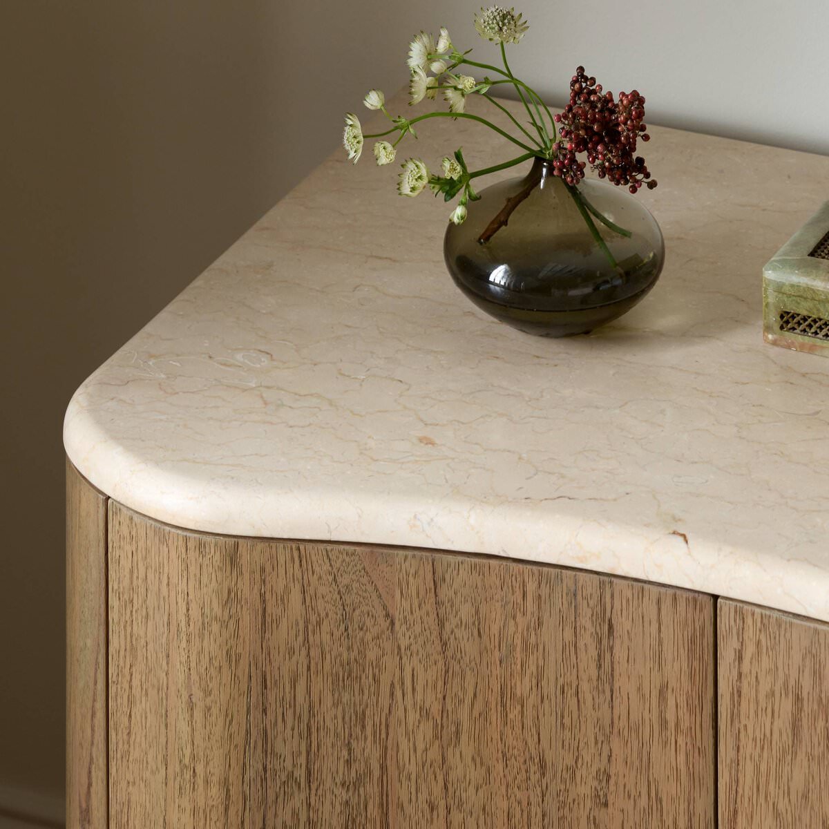 Close up of Four Hands Boa Nightstand in Cream Marble on a white background at Addison West