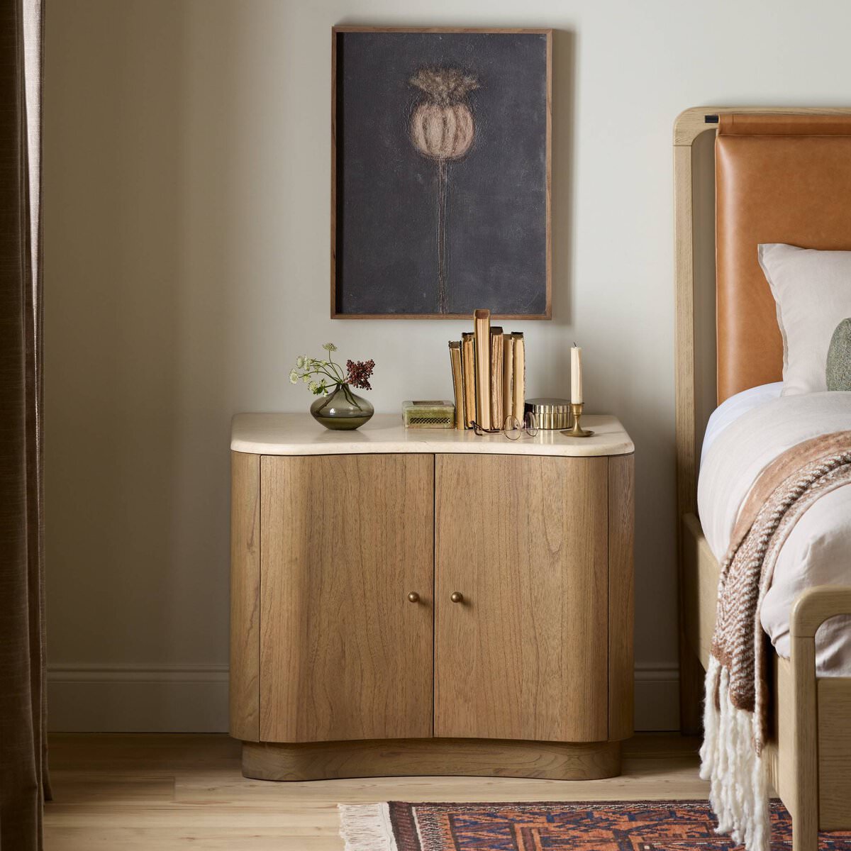Four Hands Boa Nightstand in Cream Marble in a beige bedroom at Addison West
