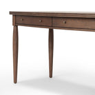 Close up of Four Hands Bowfront Desk in Drifted Oak Veneer on a white background at Addison West