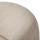 Close up of Four Hands Channing Swivel Chair in Yuma Cream on a white background at Addison West