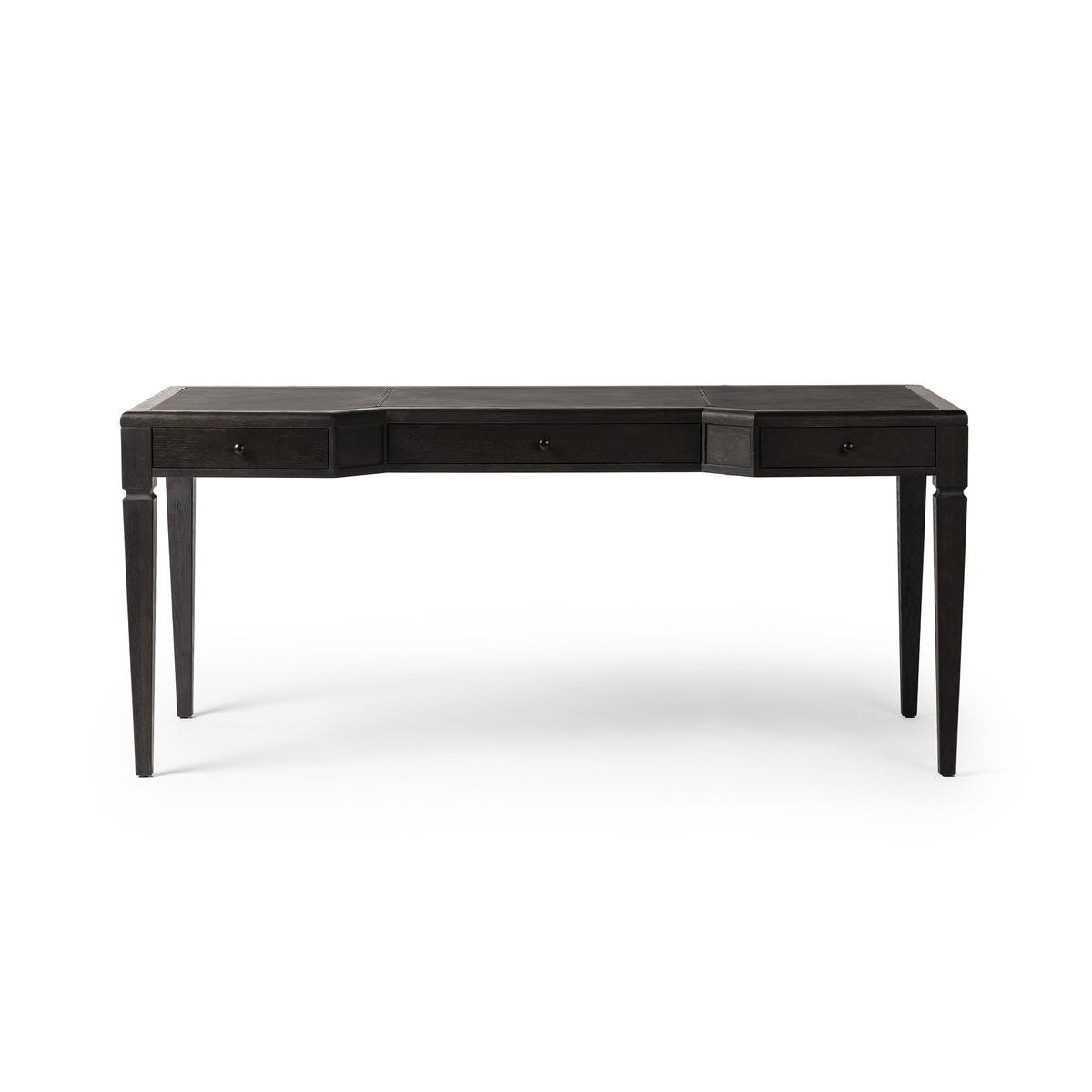 Four Hands Claude Desk in Distressed Black Oak Veneer on a white background at Addison West