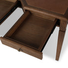 Close up of Four Hands Claude Desk in Tan Oak Veneer on a white background at Addison West