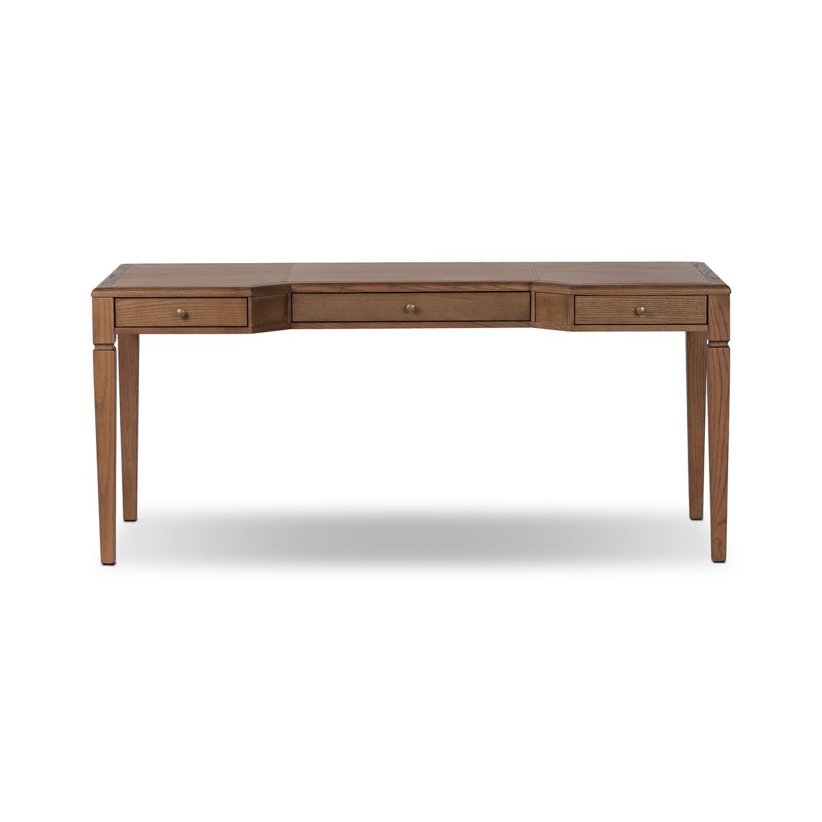 Four Hands Claude Desk in Tan Oak Veneer on a white background at Addison West
