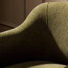Close up of Four Hands Colston Chair in Sutton Olive in a living room at Addison West