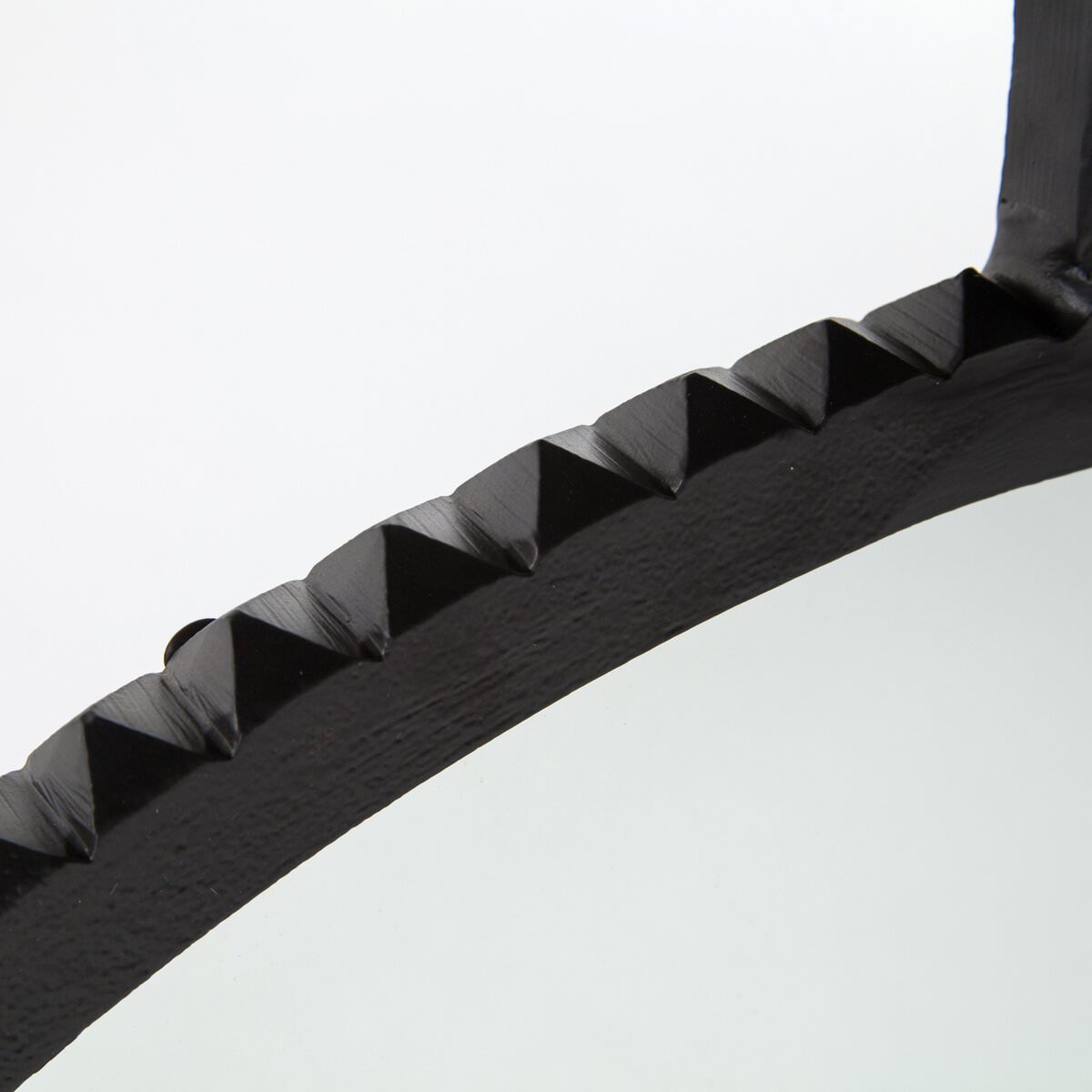 Close up of Four Hands Cru Large Mirror in Aged Bronze on a white background at Addison West