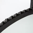 Close up of Four Hands Cru Large Mirror in Aged Bronze on a white background at Addison West