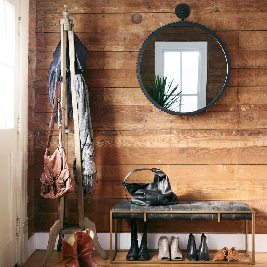 Four Hands Cru Large Mirror in Aged Bronze in an entryway at Addison West