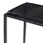 Close up of Four Hands Dalston Cast Glass Console Table in Smoked Black Cast Glass on a white background at Addison West