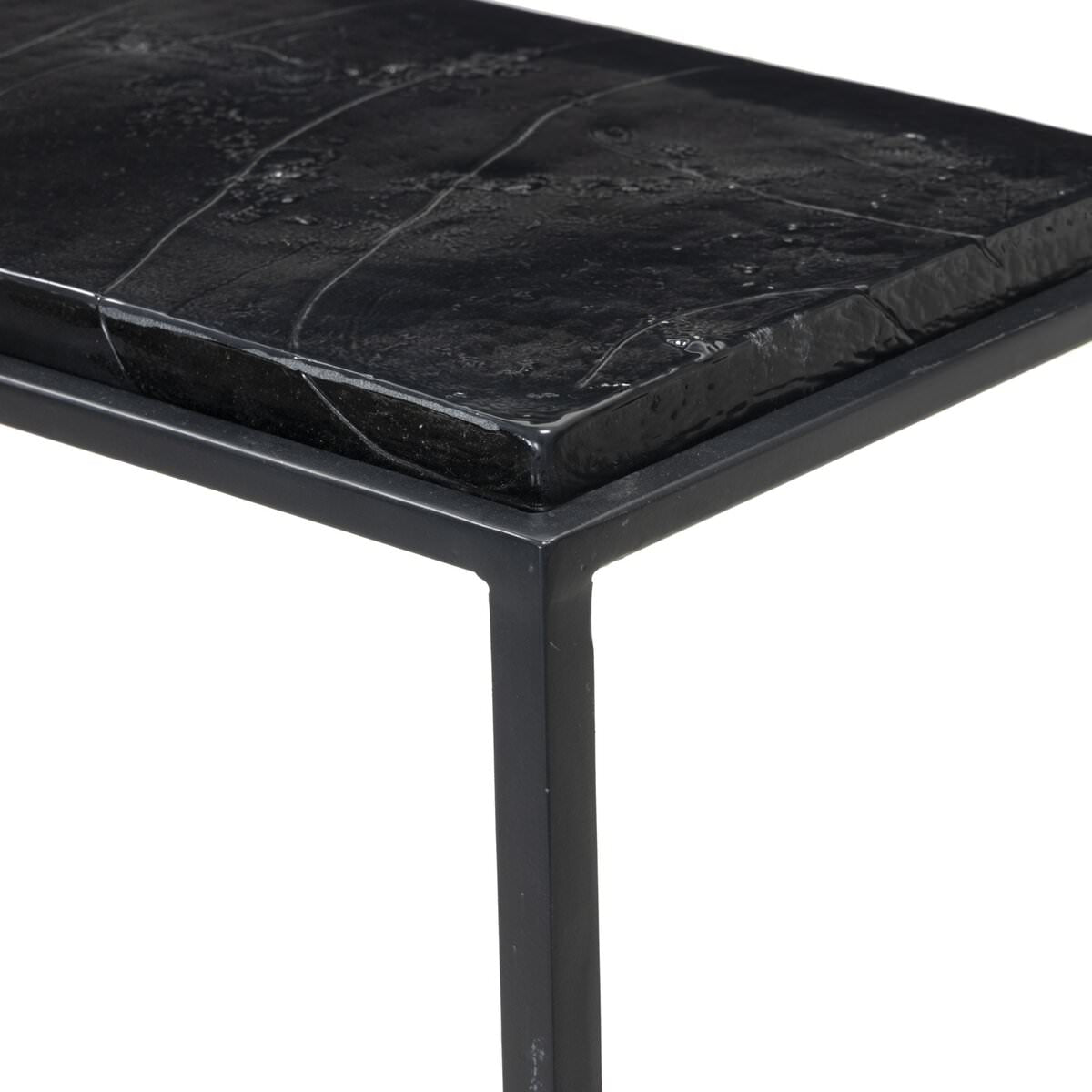 Close up of Four Hands Dalston Cast Glass Console Table in Smoked Black Cast Glass on a white background at Addison West