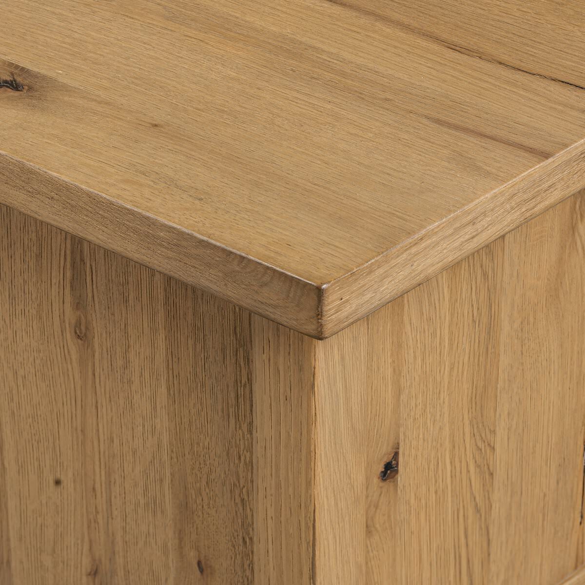 Close up of Four Hands Dalton Media Console in Aged Natural Oak Veneer on a white background at Addison West
