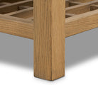 Close up of Four Hands Dalton Media Console in Aged Natural Oak Veneer on a white background at Addison West