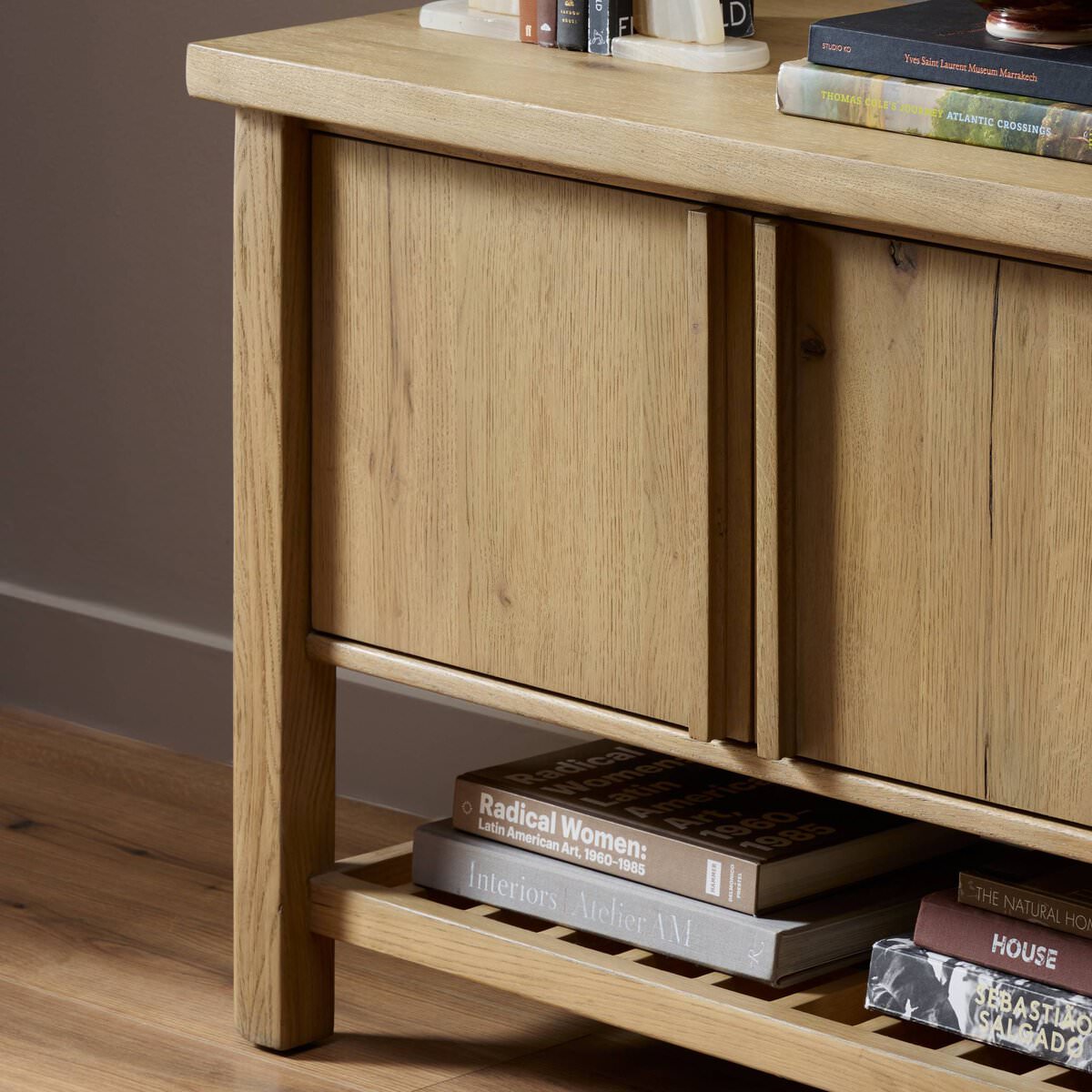Close up of Four Hands Dalton Media Console in Aged Natural Oak Veneer on a white background at Addison West