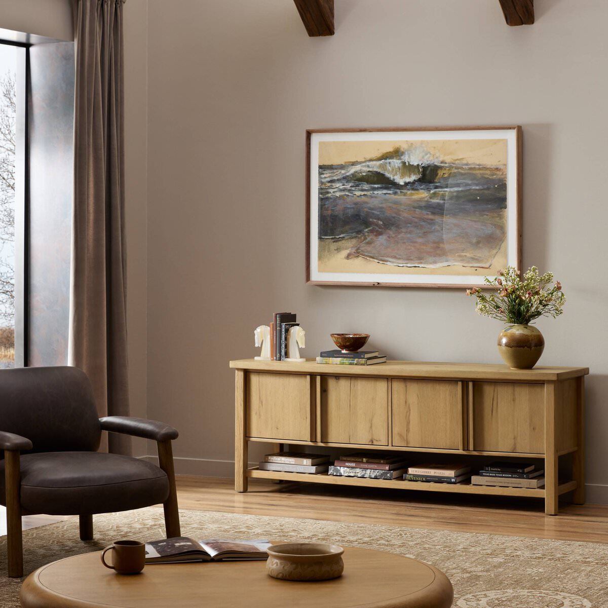 Four Hands Dalton Media Console in Aged Natural Oak Veneer in a neutral living room at Addison West