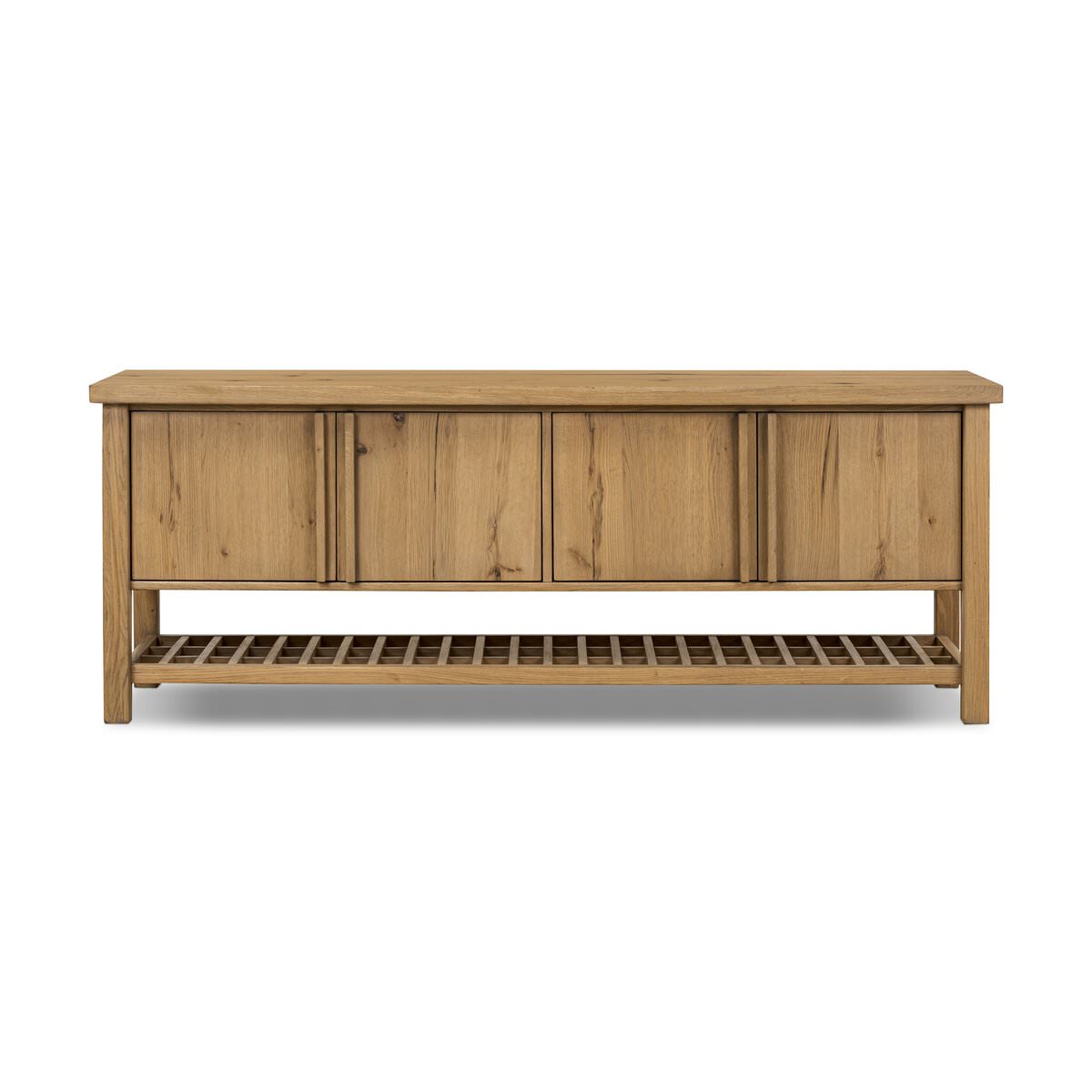 Four Hands Dalton Media Console in Aged Natural Oak Veneer on a white background at Addison West