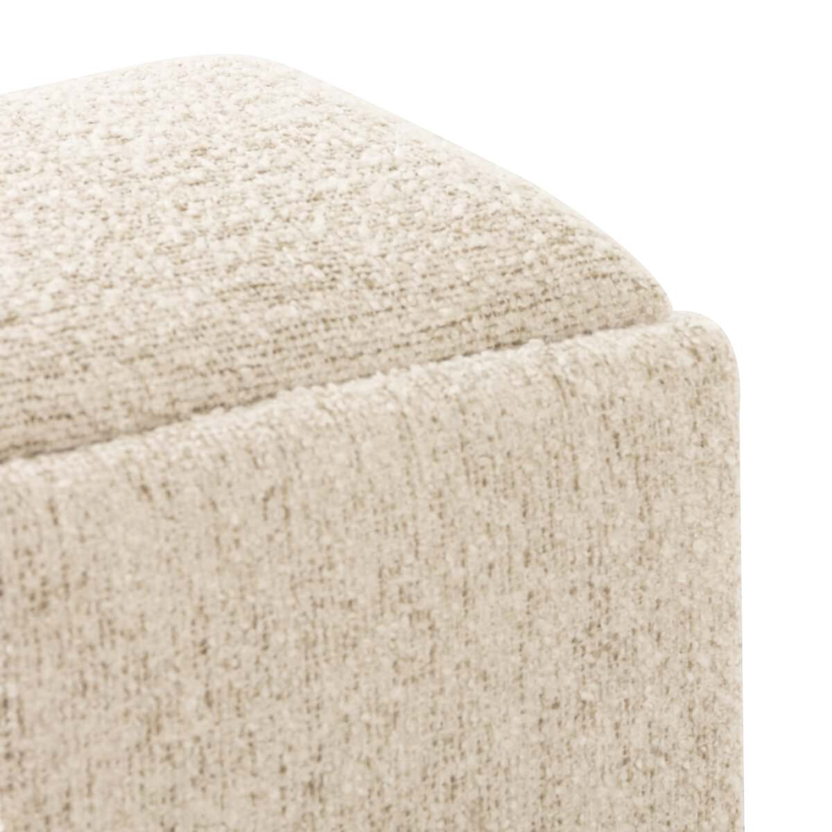 Close up of Four Hands Daniel Ottoman in Ivan Sand on a white background at Addison West