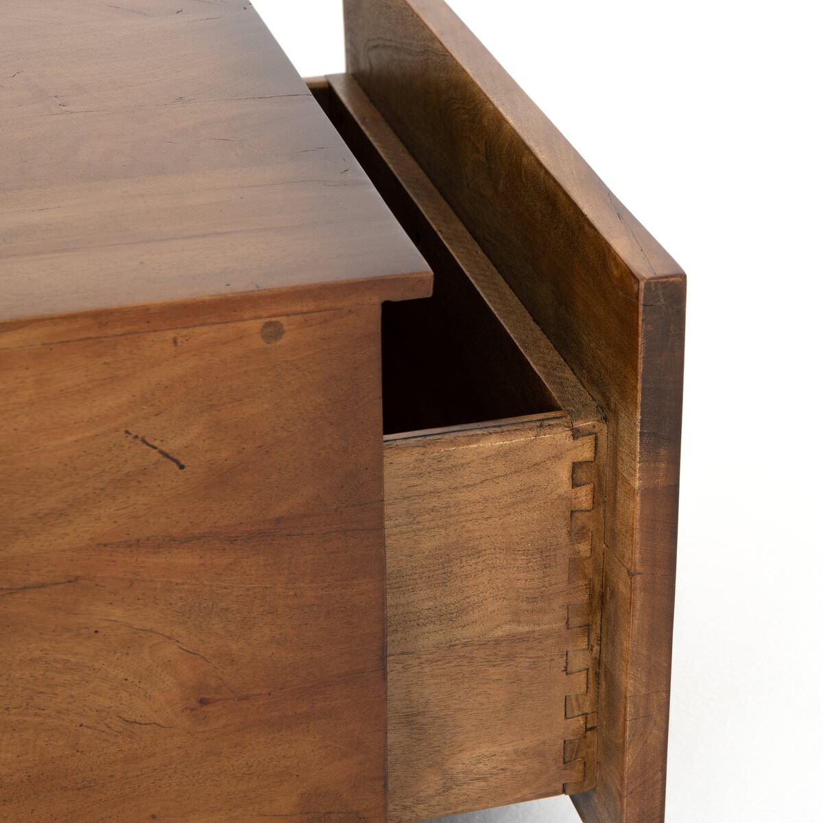Close up of Four Hands Duncan Storage Coffee Table in Reclaimed Fruitwood on a white background