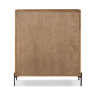 Back of Four Hands Eaton 5 Drawer Dresser in Amber Oak Resin on a white background at Addison West