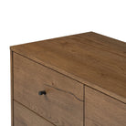 Close up of Four Hands Eaton 5 Drawer Dresser in Amber Oak Resin on a white background at Addison West