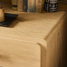 Close up of Four Hands Eden Nightstand in Aged Smoked Oak Veneer on a white background at Addison West