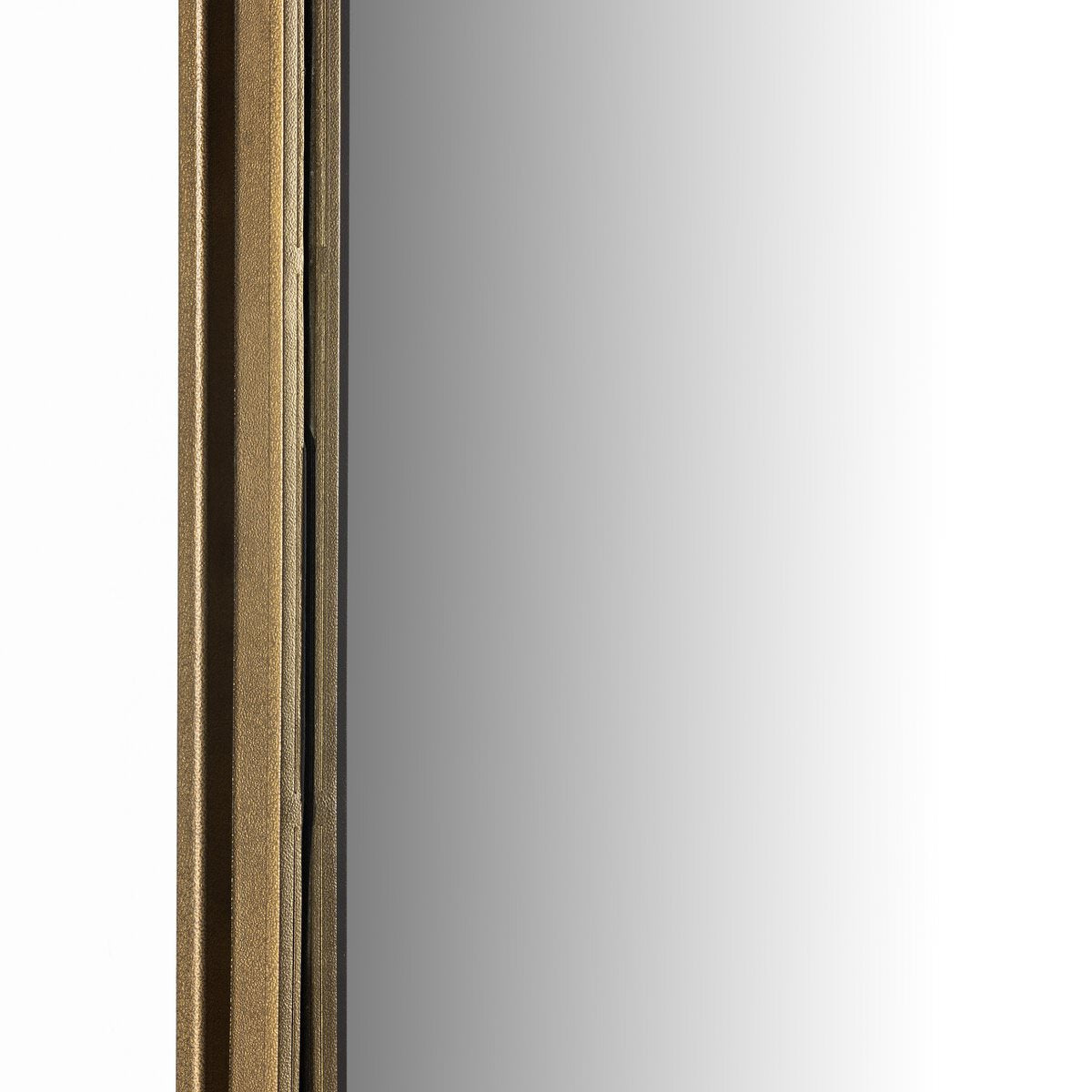 Close up of Four Hands Effie Mirror in Raw Antique Brass on a white background at Addison West