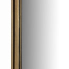 Close up of Four Hands Effie Mirror in Raw Antique Brass on a white background at Addison West