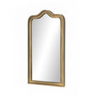 Four Hands Effie Mirror in Raw Antique Brass on a white background at Addison West