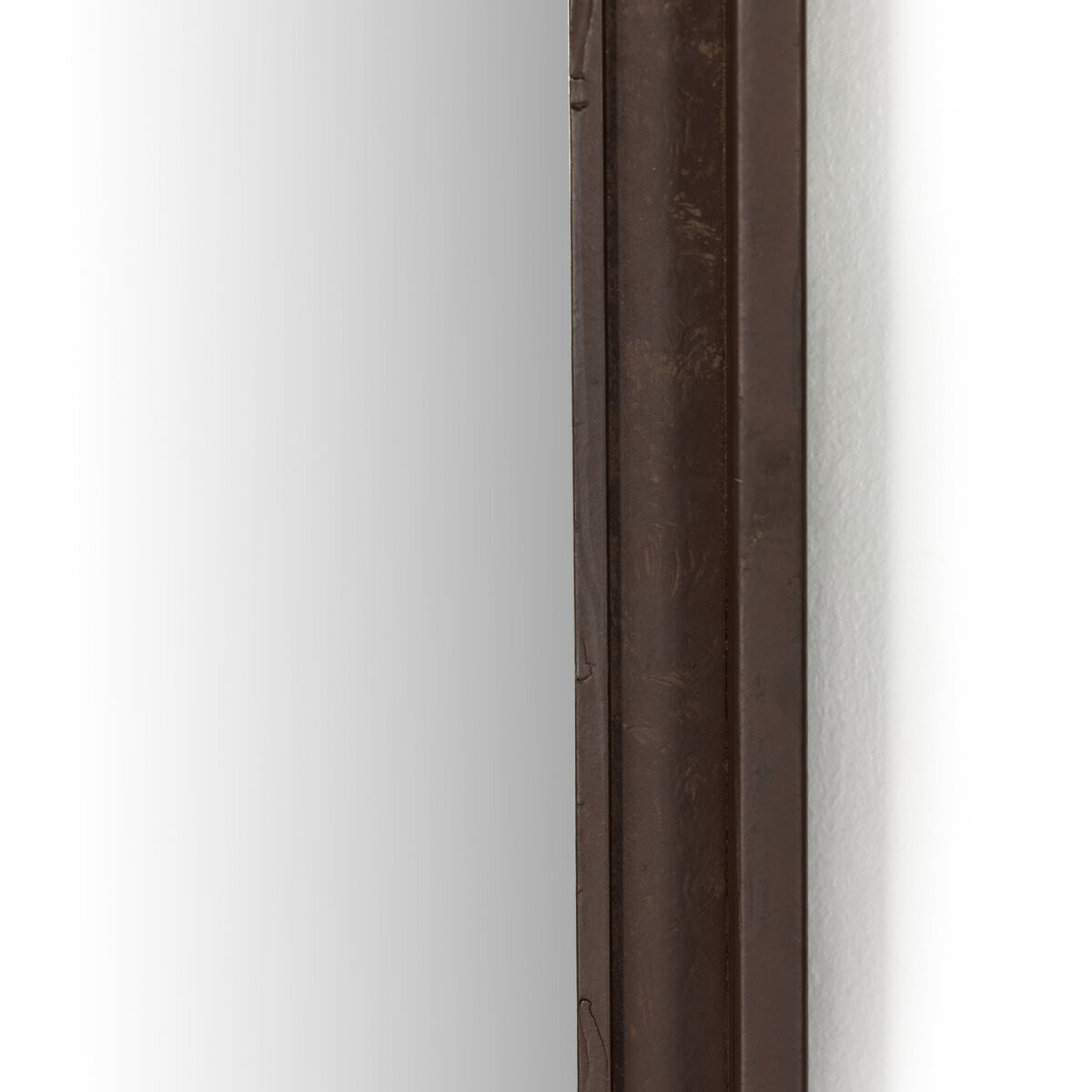 Close up of Four Hands Effie Mirror in Rustic Iron on a white background at Addison West